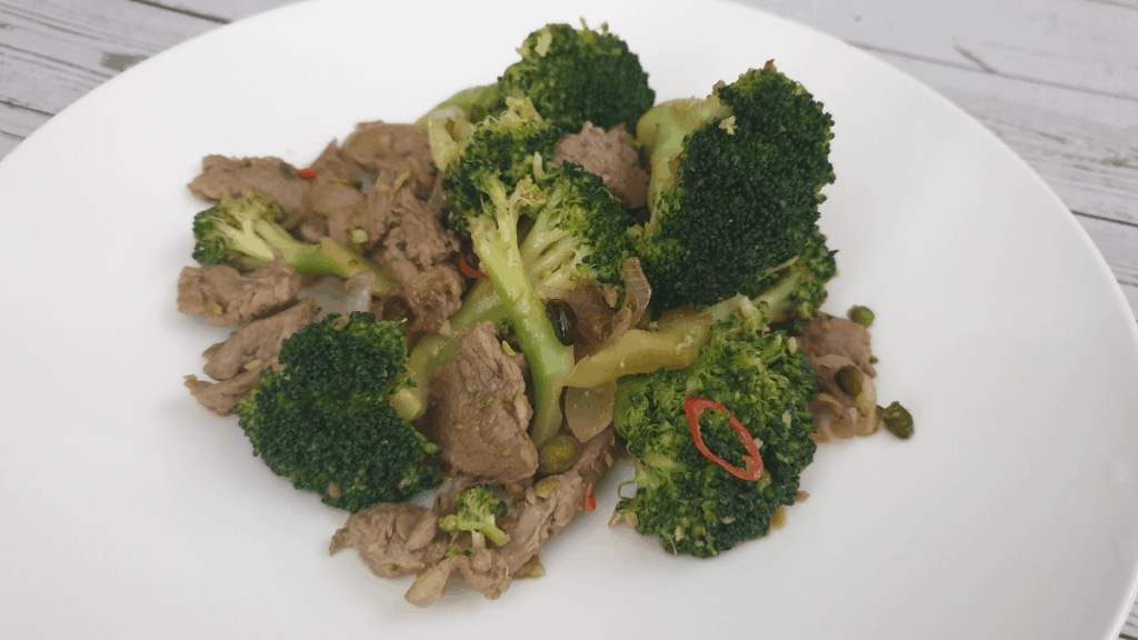 Sauteed Veal with Lemon on a Bed of Broccoli Rabe | Chris F. Nicholson